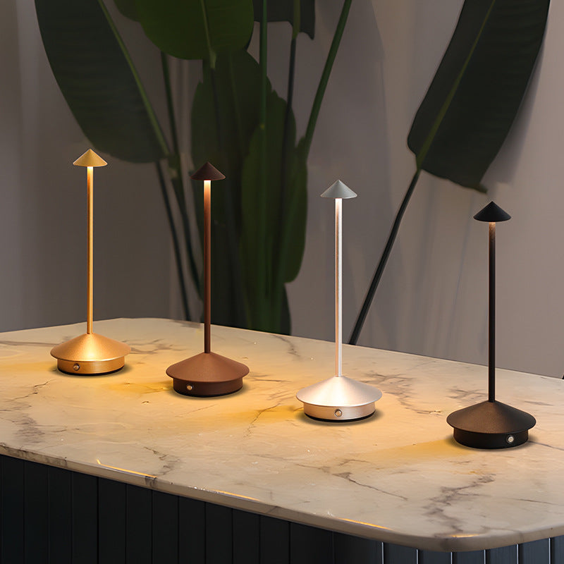 Elegant portable LED table lamp with dimmable light, modern design for home decor & outdoor ambient lighting.