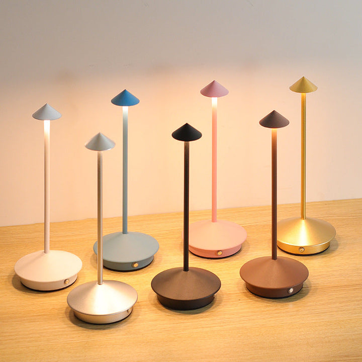 Versatile wireless LED table lamp, modern design for indoor/outdoor home decor, dimmable & portable.