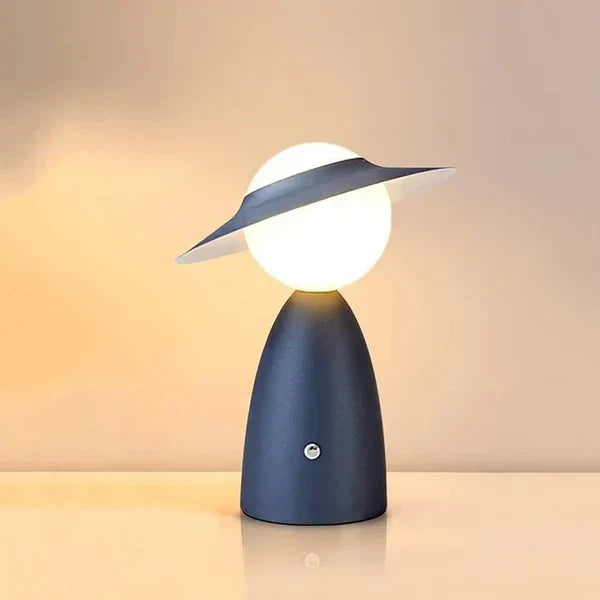 Contemporary wireless desk lamp with LED lighting & built-in charging station, offering convenience & sleek design.