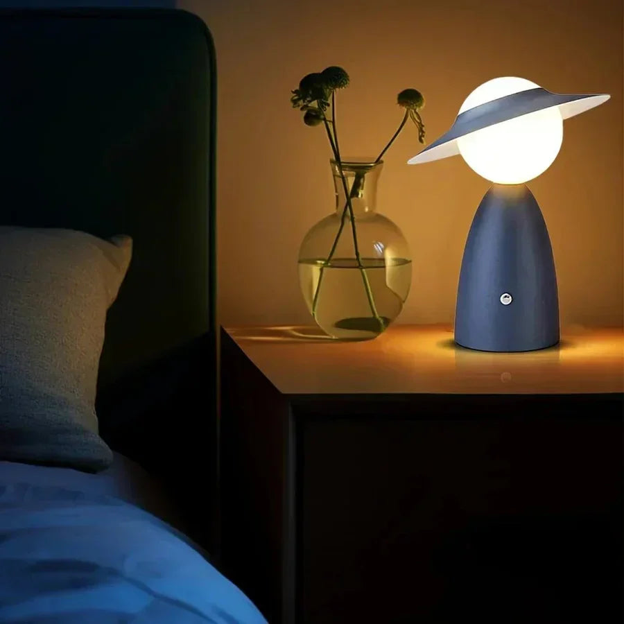 Versatile wireless table lamp, doubles as a smartphone charging station; dimmable LED light for any modern space.