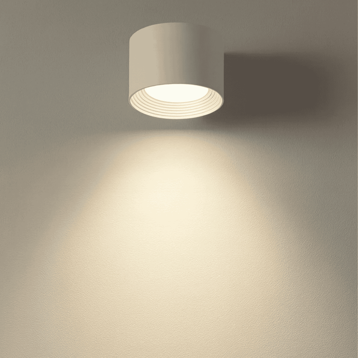 Minimalist modern wall lamp, wireless LED light with remote for ambient home decor. Easy to install.