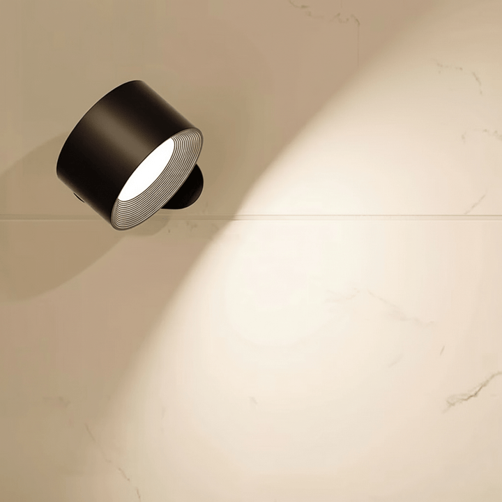 Modern wireless LED wall light with remote control. Rechargeable for easy, dimmable ambient lighting in any room.