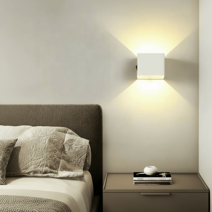 Decorative accent wall light: modern wireless LED fixture with adjustable beam, ideal for contemporary home decor.