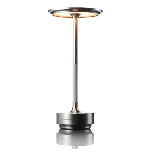 Dimmable LED wireless smart desk lamp. Modern metallic design provides ambient lighting for home or office.