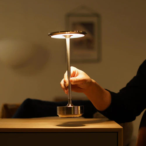 Modern dimmable LED smart table lamp, wireless design for versatile use as a desk, bedside, or accent light.