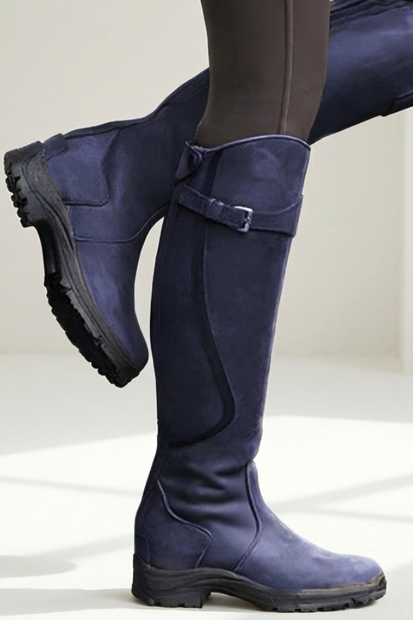Stable sole knee-high boots for women, offering modern comfort. Perfect for winter fashion and casual elegance.