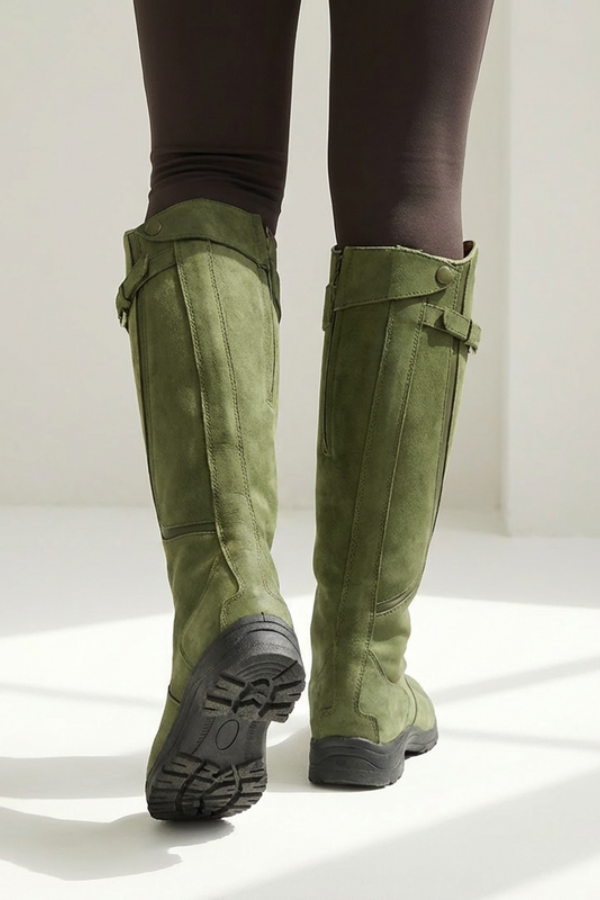 Elegant long boots for women featuring a stable sole. Comfortable knee-high design for winter & casual wear.