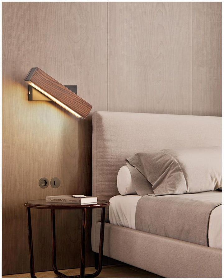 Adjustable wooden LED wall lamp for modern decor, a stylish and energy-efficient indoor lighting solution.
