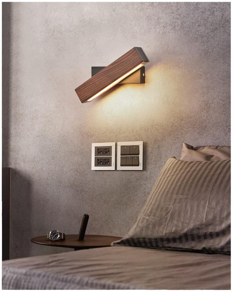 Natural wood LED wall lamp, adjustable & energy-efficient, enhancing contemporary home lighting decor.