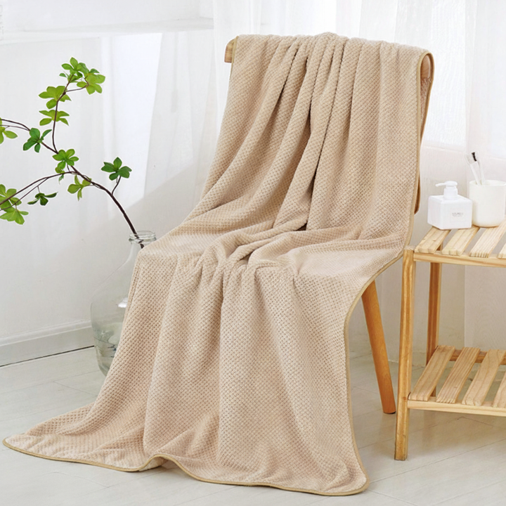 Unisex quick dry coral fleece towel, perfect for home, gym, or beach, emphasizing absorbency.