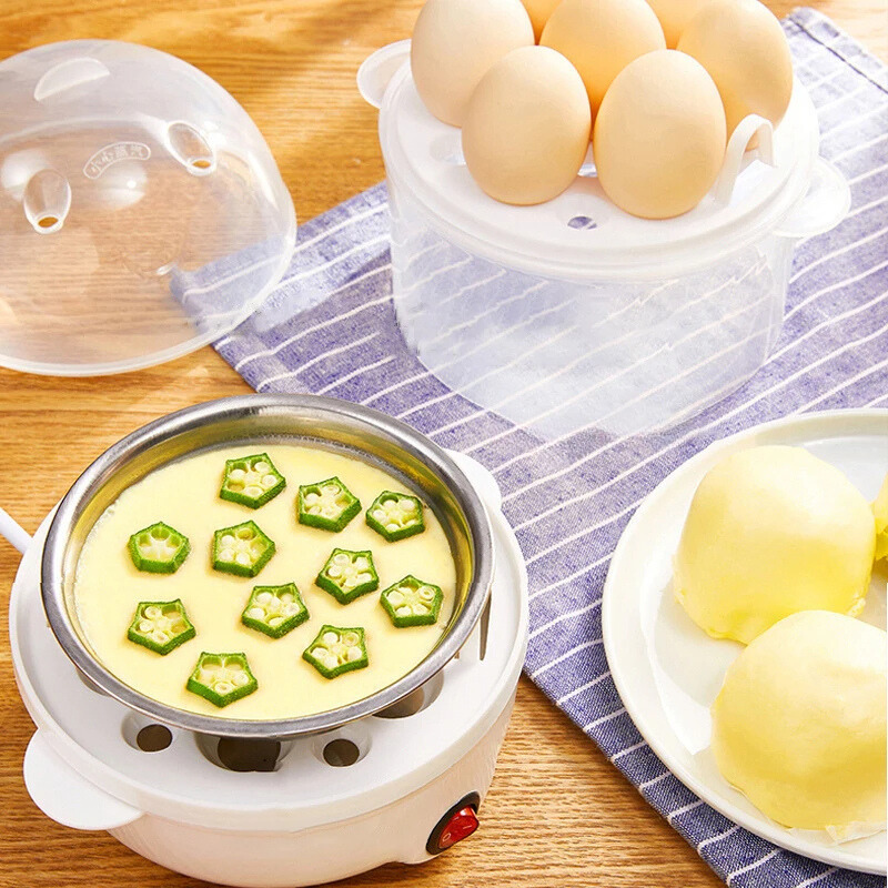 Compact electric egg cooker & food steamer with rapid boil for convenient healthy breakfast and versatile meal prep.