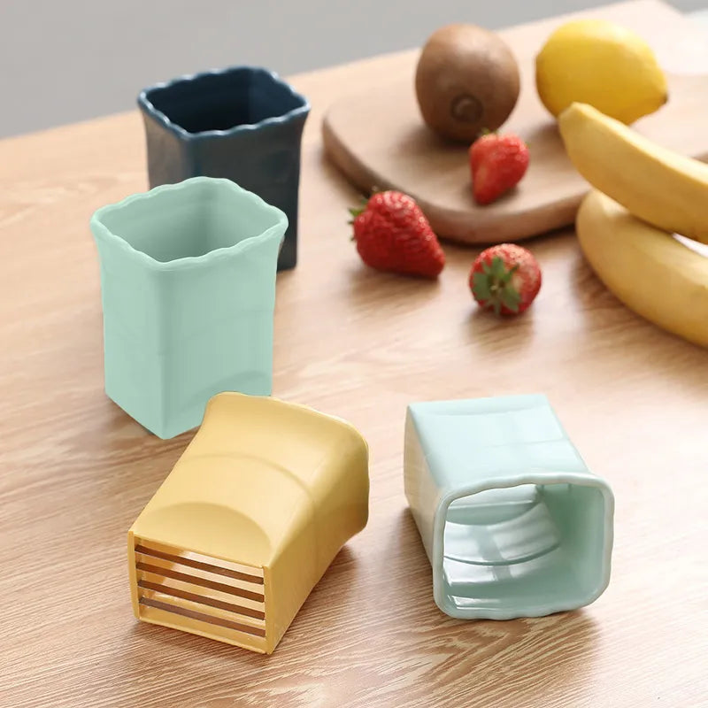 Versatile kitchen aid: food chopper, vegetable slicer, & fruit cutter. Quick & easy meal prep tool.