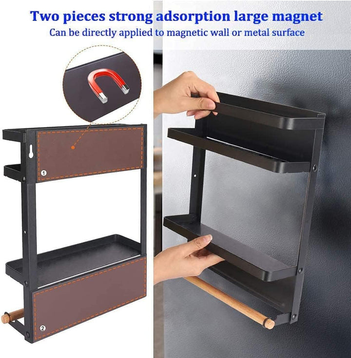 Close-up of a magnetic kitchen storage rack, holding spices and a roll of paper towels on a fridge.