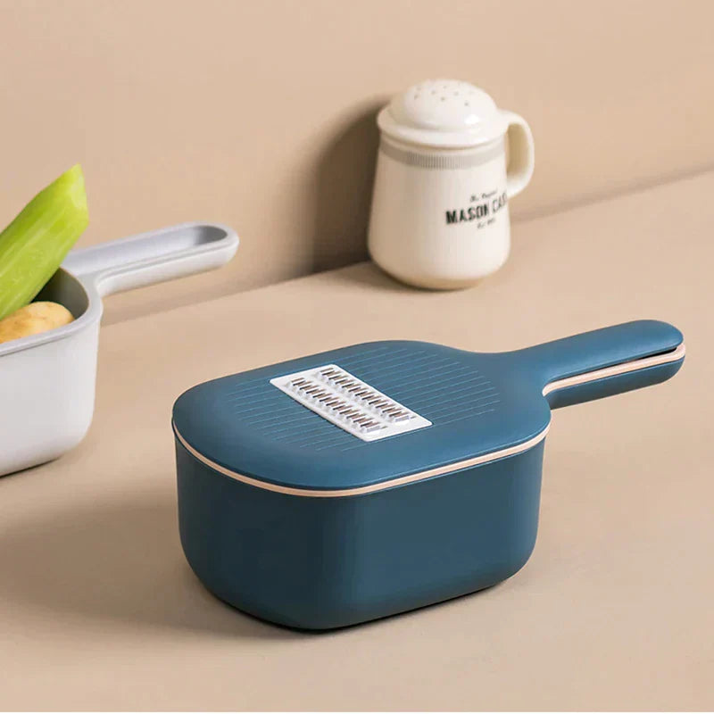 Easy-to-use vegetable slicer & chopper with a convenient drain basket, ideal for fast and clean kitchen tasks.