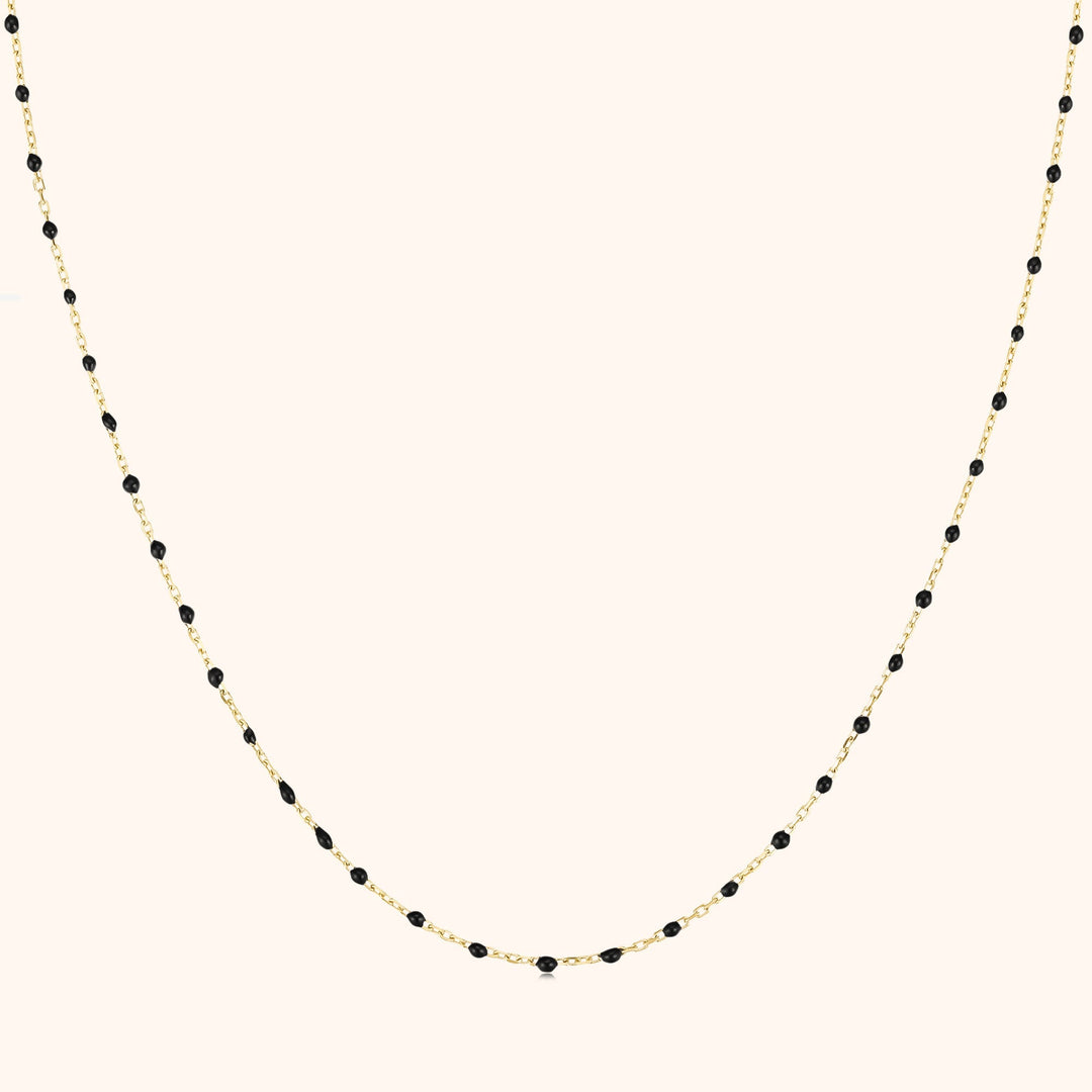 Mystical black pearl necklace for women, sterling silver, gold-plated, and adjustable, ideal elegant fashion jewelry.