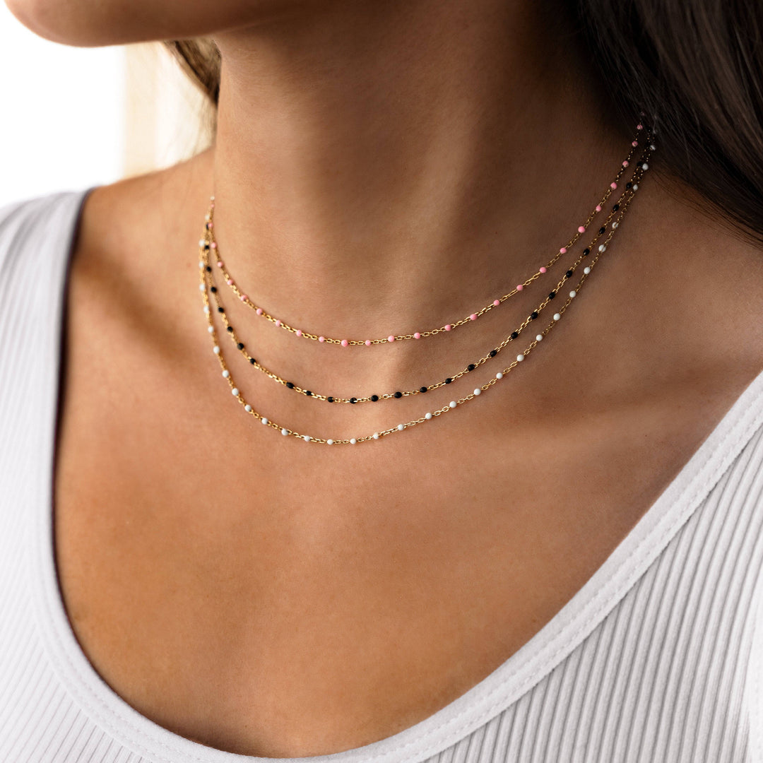Stunning women's black pearl necklace, Lyra design, with adjustable gold-plated sterling silver chain.