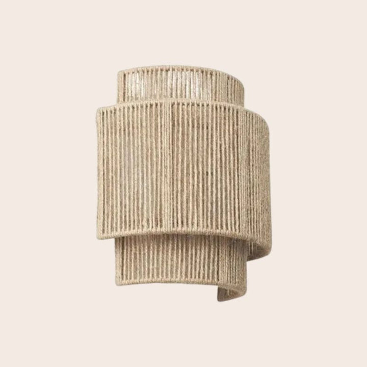 Natural rattan woven wall lamp, perfect boho accent lighting for modern home decor.