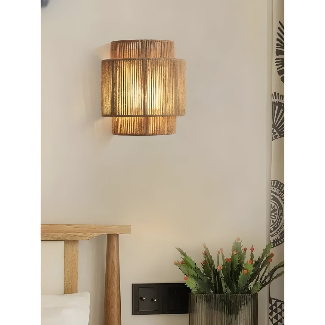 Soft glow natural rattan wall lamp, adding warm ambient light to modern boho interiors.