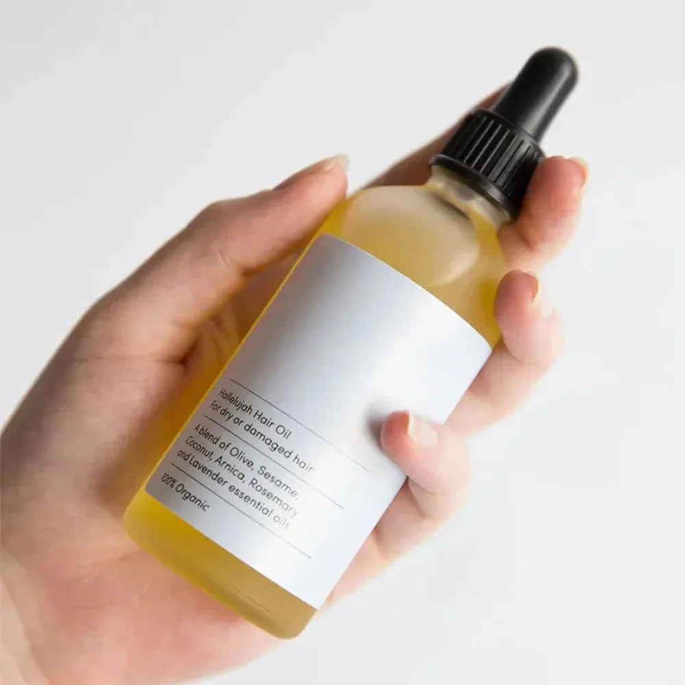 Natural Rosemary Scalp & Hair Growth Oil for thicker, stronger hair. Vegan & cruelty-free hair care.