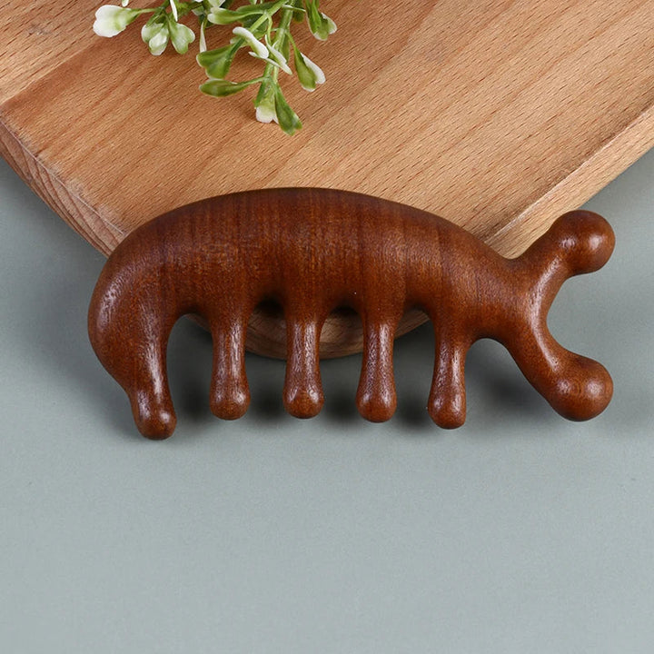 Sandalwood hair massage comb for a relaxing scalp treatment. Boosts circulation, promotes hair growth & healthy, shiny hair.