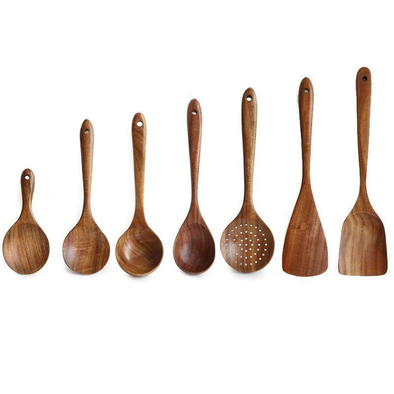 Close-up of natural wood grain on a RustiCook kitchen utensil, showing quality & texture.