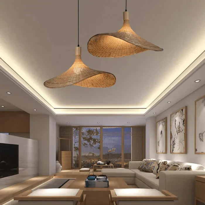 Natural woven rattan pendant lamp, ideal for rustic & bohemian home decor. Handmade ceiling light adds warmth.