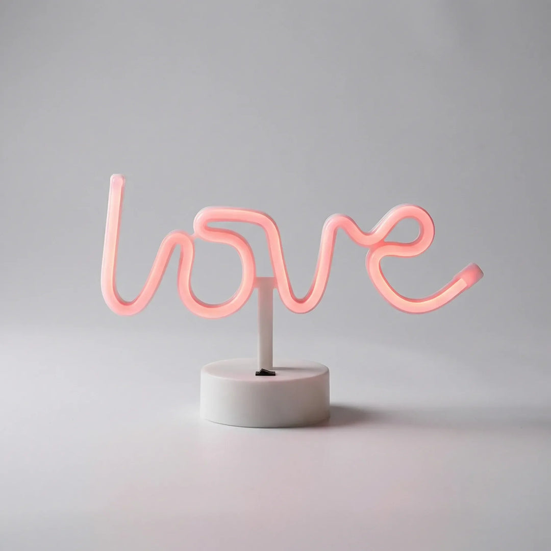 Close-up of a Freestanding LED Neonova table lamp, showcasing bright green light