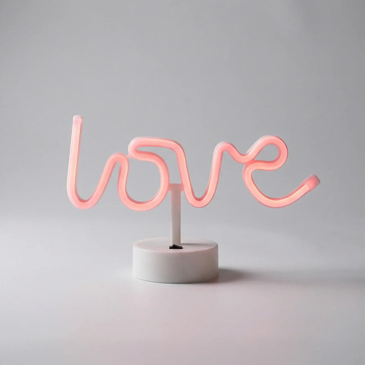 Close-up of a Freestanding LED Neonova table lamp, showcasing bright green light