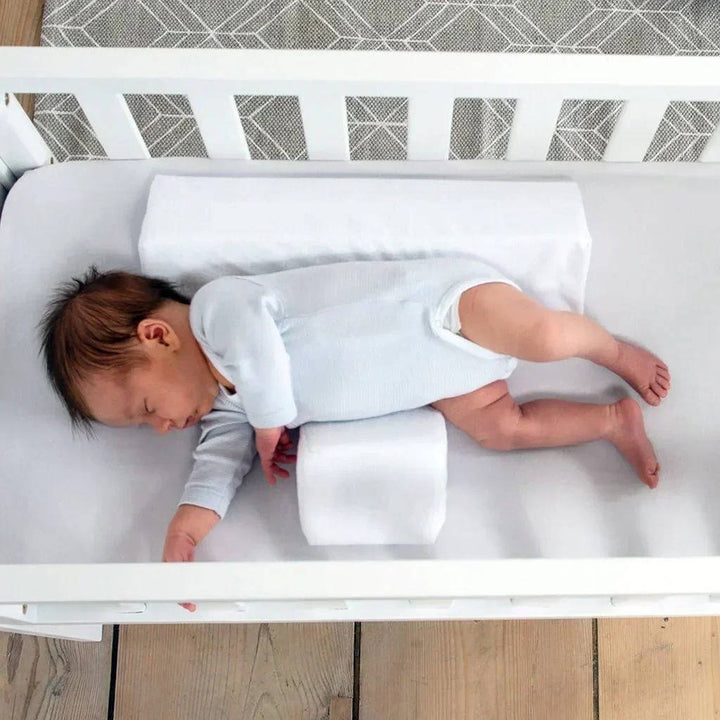 Newborn side sleeper wedge for longer, safer, uninterrupted baby sleep.