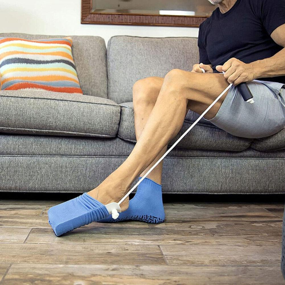 User-friendly sock wearing device for easy application. Aids elderly & those with limited mobility or back issues.