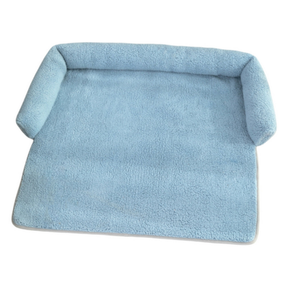 Non-slip dog blanket with integrated neck pillow for small to medium pets. Cozy, washable pet bed for comfort.