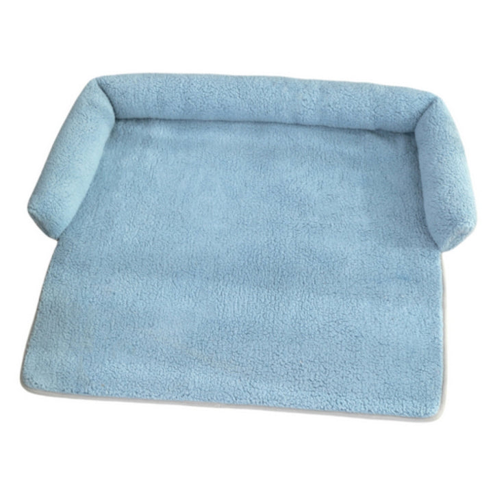 Non-slip dog blanket with integrated neck pillow for small to medium pets. Cozy, washable pet bed for comfort.