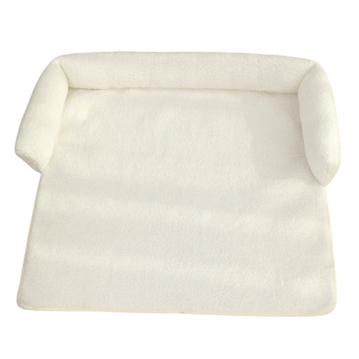 Cozy non-slip pet blanket with neck pillow. Provides comfort & support for small to medium dogs in their bed.