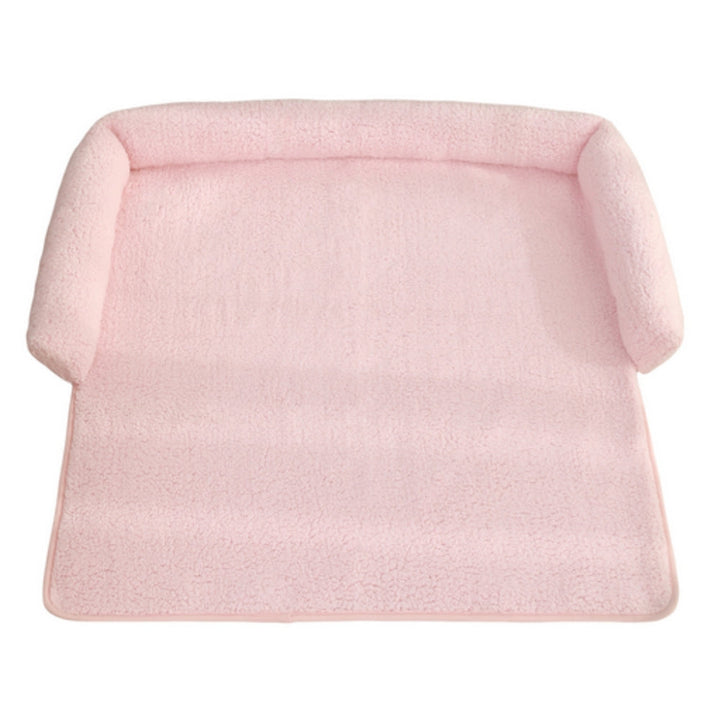 Secure non-slip dog blanket featuring a comfy neck pillow. Perfect cozy pet bed for small to medium dogs.