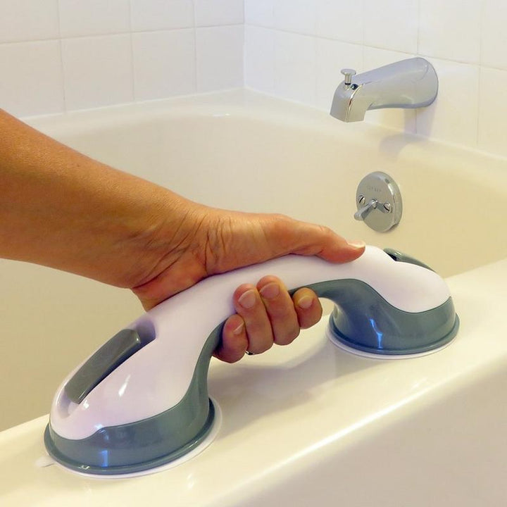 Secure non-slip shower handle grab bar, essential for bathroom safety. Powerful suction cups for dependable bath support.