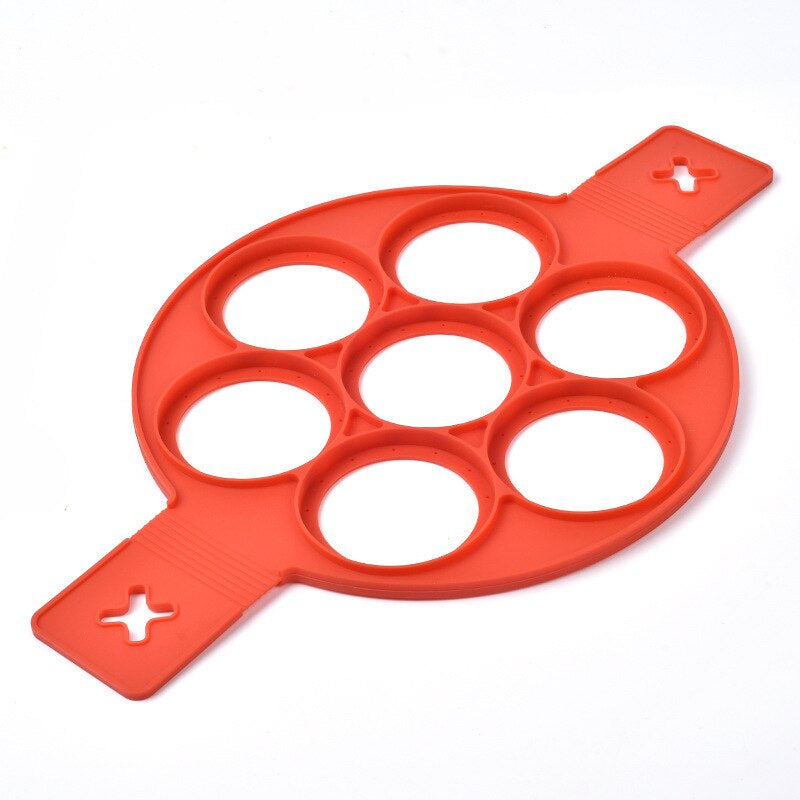 Versatile non-stick multi-mold pan for pancakes, eggs, & omelets. Cook heart or circle shapes with ease.