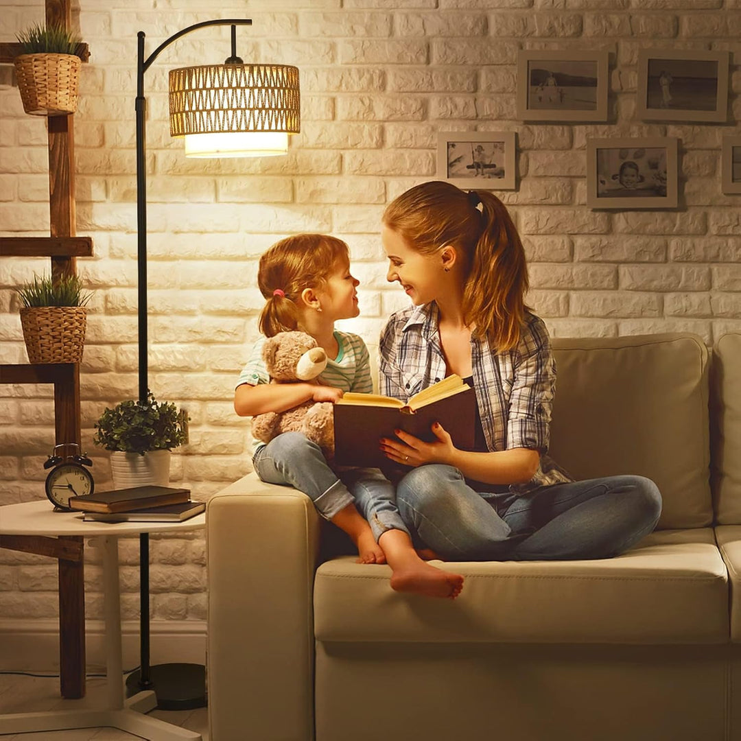 Remote control for the Norvella Arc Floor Lamp, showing intuitive buttons for light adjustment
