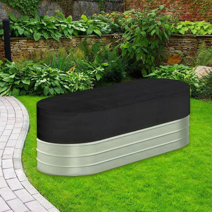 Novyra waterproof UV-resistant rip-proof ice bath cover protecting an outdoor stock tank.