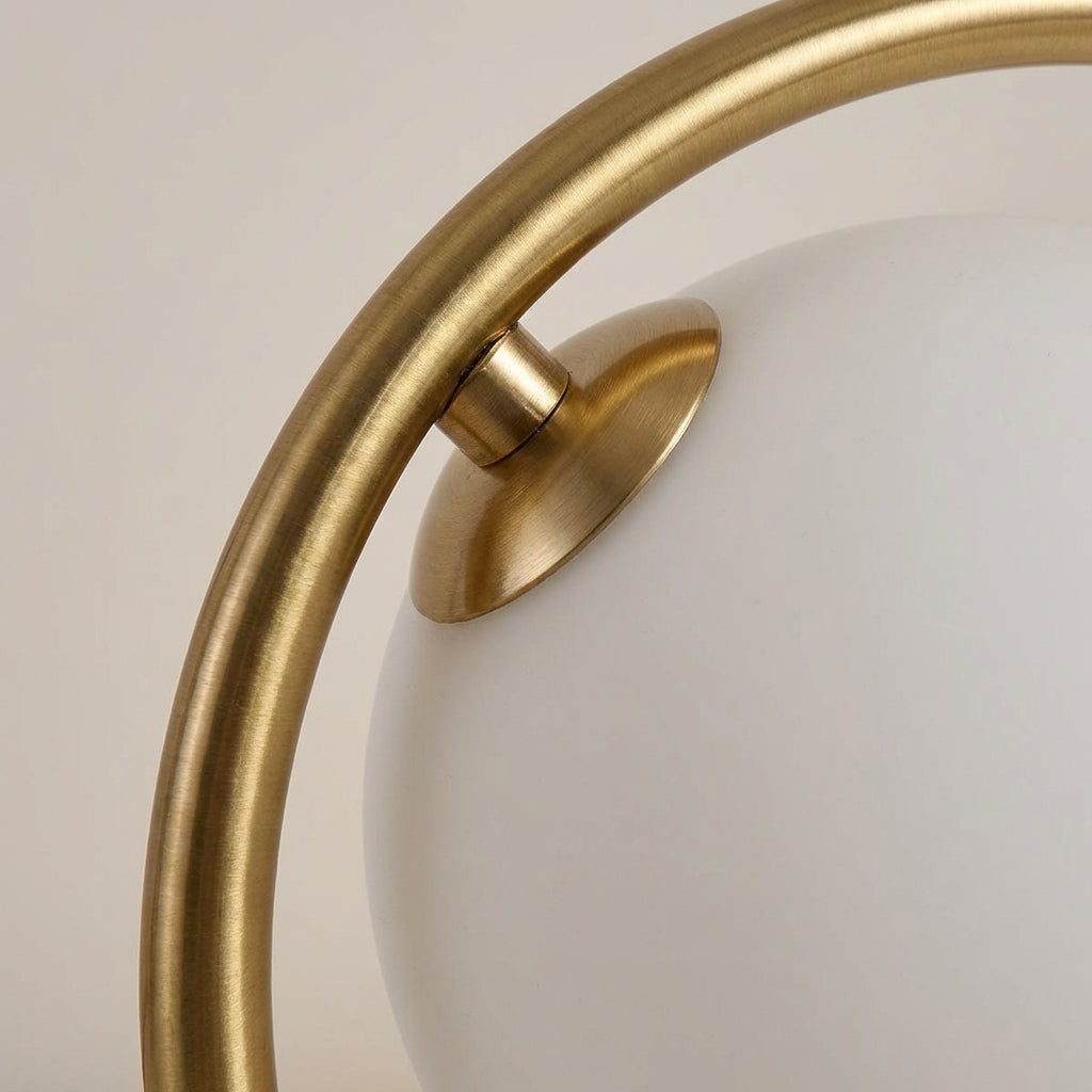 Dimmable Orbella LED ring table lamp providing soft, contemporary light for any room's decor.