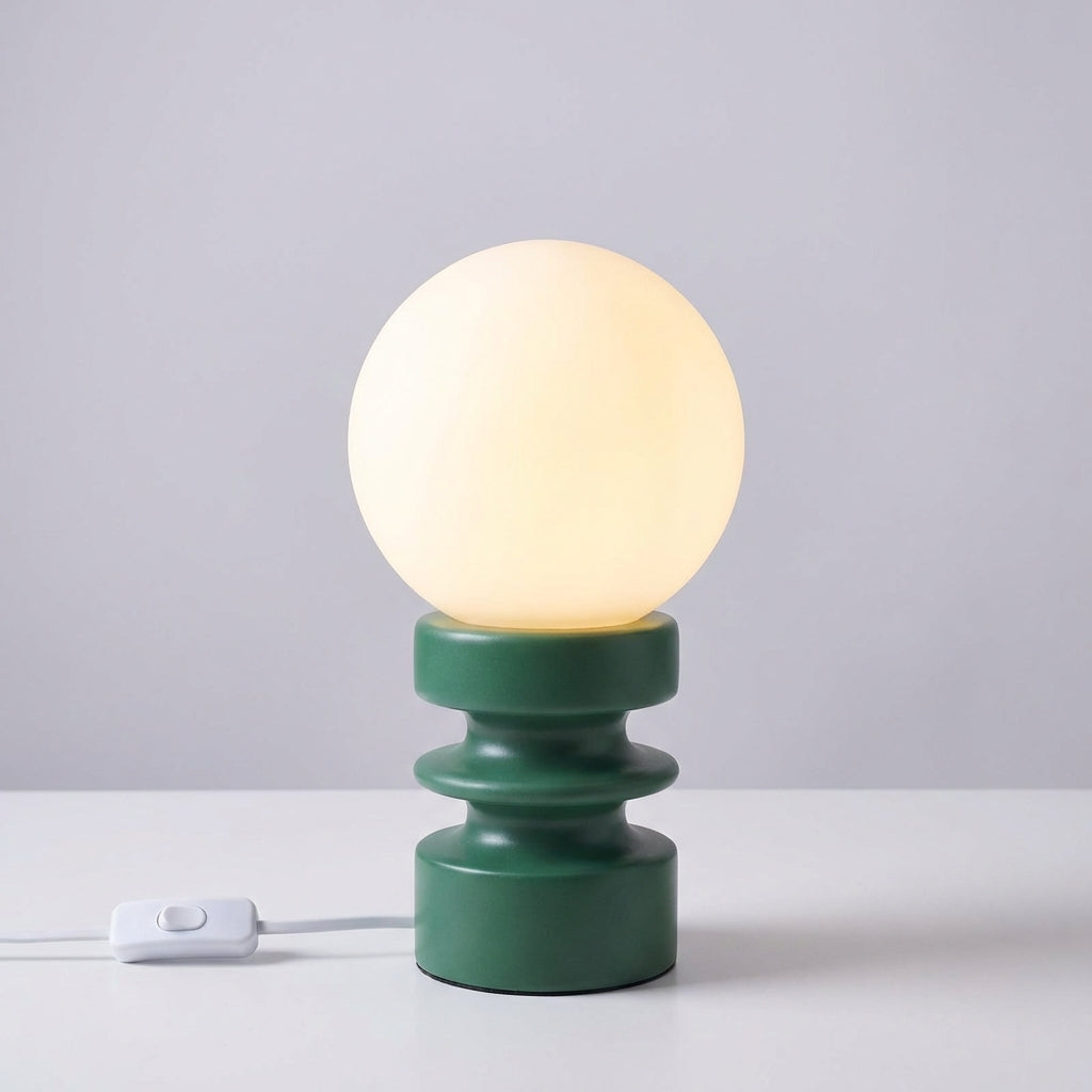 Mid-century modern-style Orbisio desk lamp featuring a white globe and a natural wood base, LED compatible