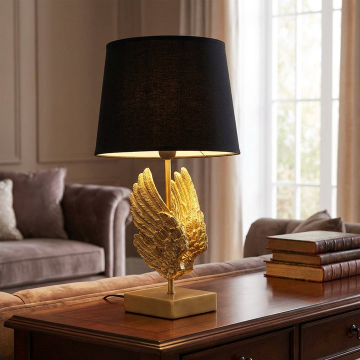 Ornate Wing Table Lamp Aurelium, elegant sculptural metal & resin design, ambient light for bedroom or living room decor