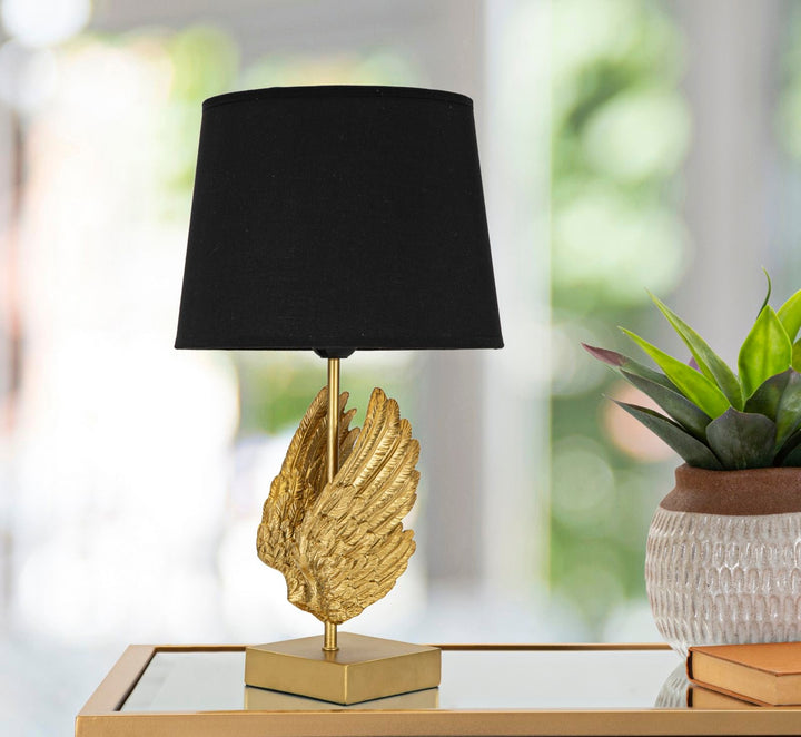 Stylish Aurelium Ornate Wing Table Lamp, unique sculptural design, enhancing home decor with soft ambient light