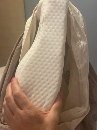 Contoured memory foam neck pillow with ergonomic design for optimal sleep posture & comfort.
