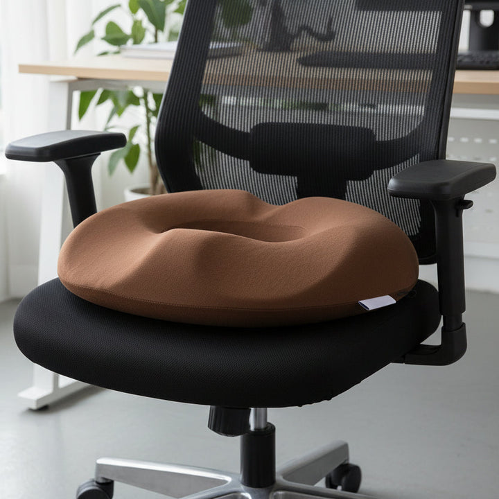 Orthopedic memory foam seat cushion for tailbone & back pain relief, ideal for office chairs & car seats.