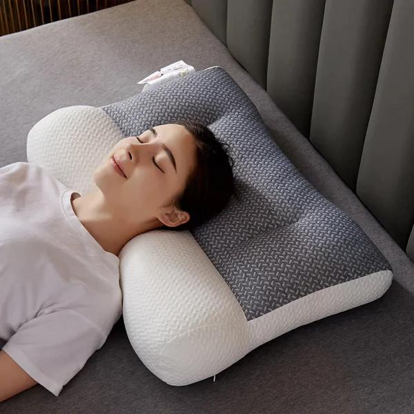 Orthopedic neck pillow for enhanced sleep comfort & pain relief. Ergonomic design supports spinal alignment.
