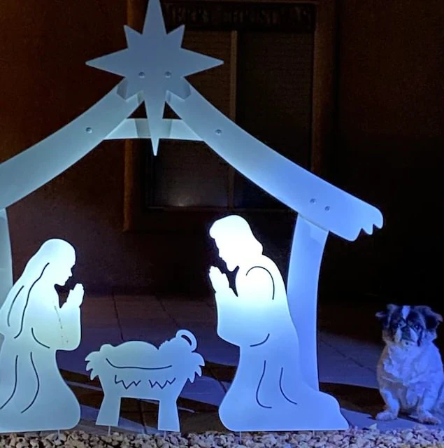Festive outdoor Holy Night Nativity scene, a beautiful Christian Christmas yard display for holiday celebrations.