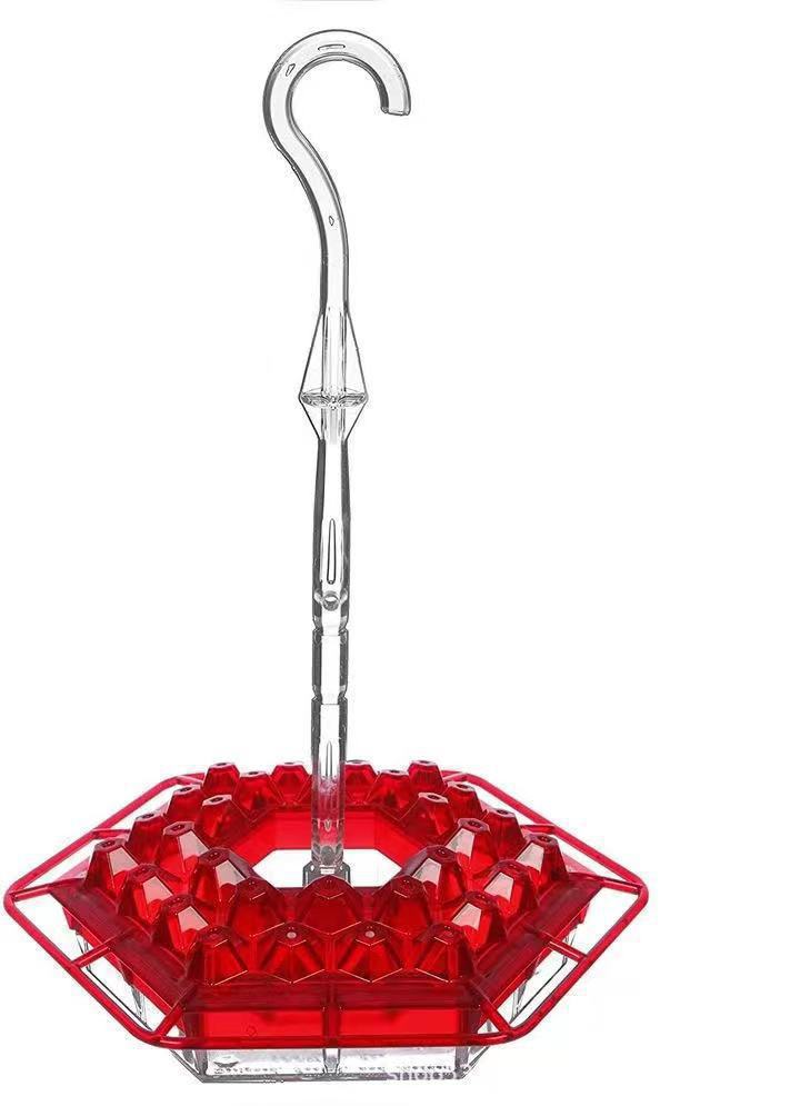 Durable polycarbonate hummingbird feeder, pest resistant and weatherproof for year-round outdoor display.