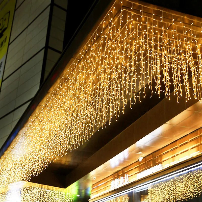 Waterproof LED icicle lights on a house for Christmas. Perfect outdoor winter holiday decoration.