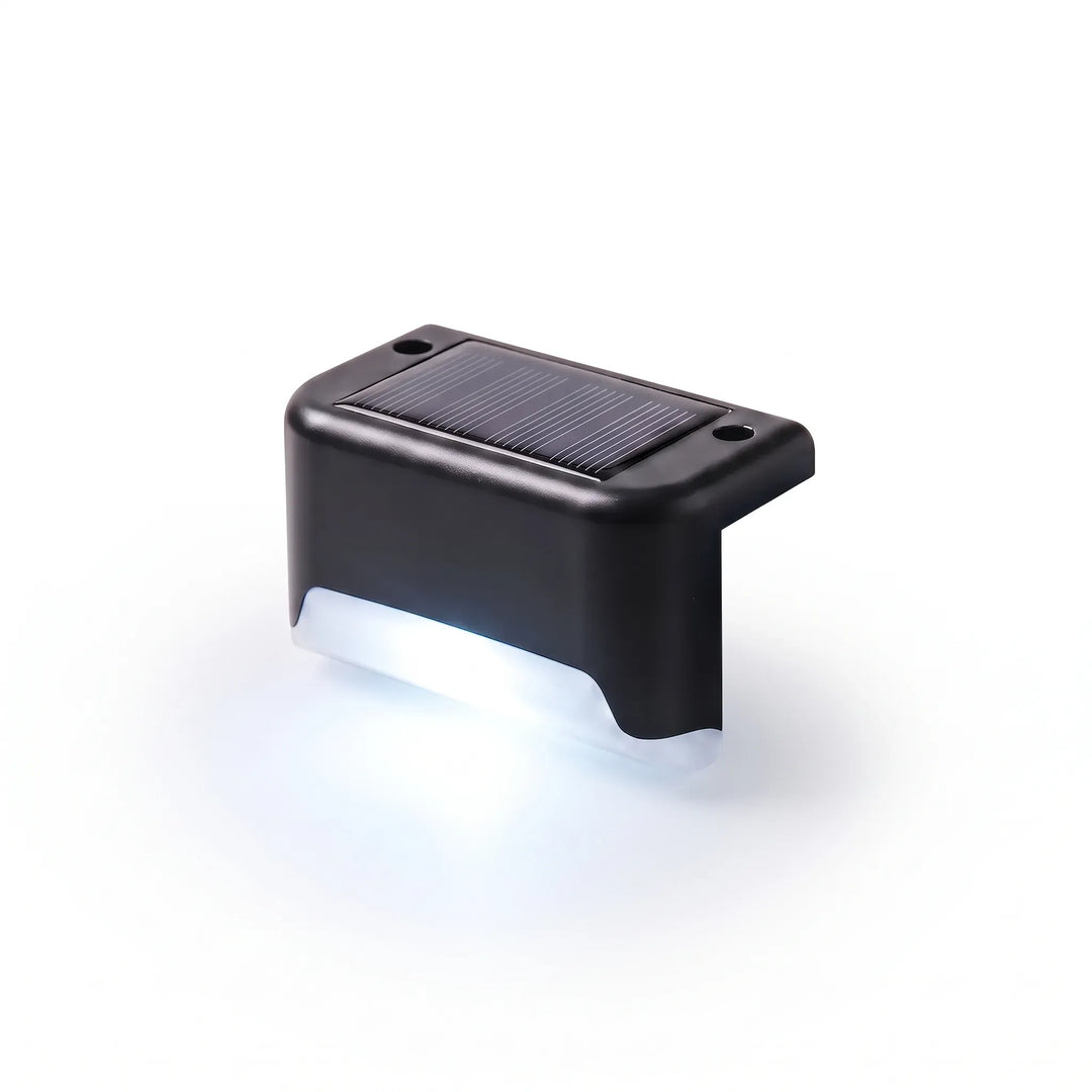 Decorative warm white LED solar lights for decks, steps & patios, creating beautiful outdoor ambiance.