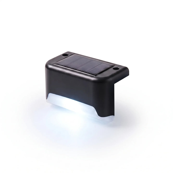 Decorative warm white LED solar lights for decks, steps & patios, creating beautiful outdoor ambiance.